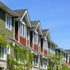 Green and red apartment building