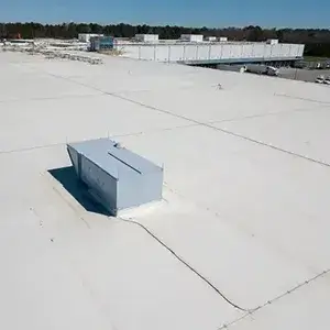 Flat, white warehouse rooftop